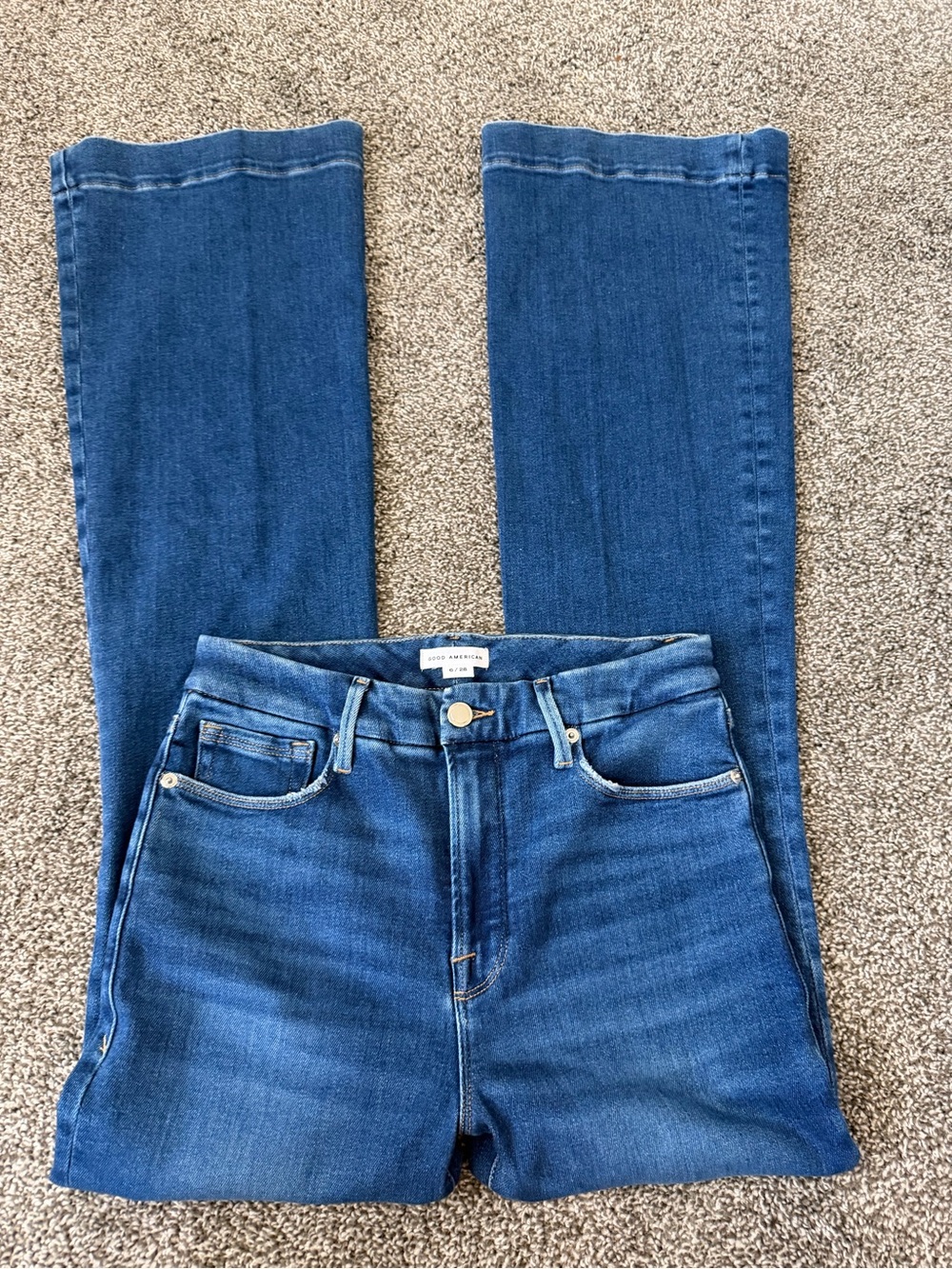 Good American Good Flare Mid Rise stretch denim jeans in Indigo